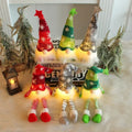 Kerstdecoratie - Gezichtsloze pop met LED-licht en pluche afwerking 2